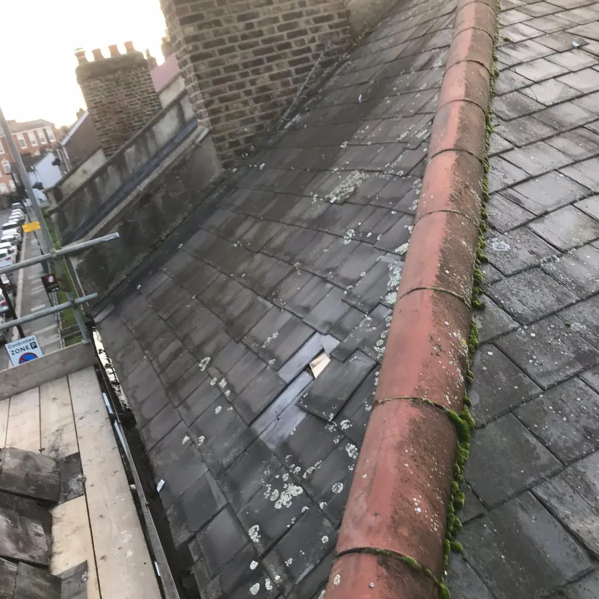 damaged tilled roof